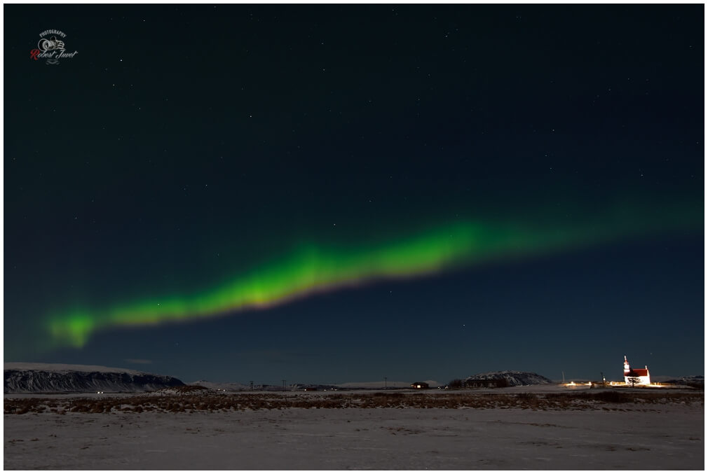 Aurora über der Hraungerdiskirkja bei Selfoss