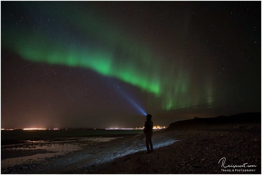 Kopflampen und Polarlichter machen sich immer gut zusammen auf einem Foto